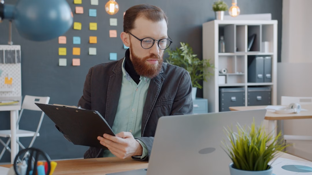 micro-credentials value professional education — hiring manager reviewing verified credentials on laptop